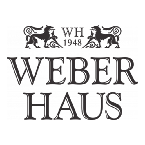 clientes_logo_weber_haus_500x500px Logotipo da marca Weber Haus, composto por dois leões estilizados voltados para o centro, ladeando as letras “WH 1948” na parte superior, e o nome “WEBER HAUS” em fonte serifada destacada na parte inferior.